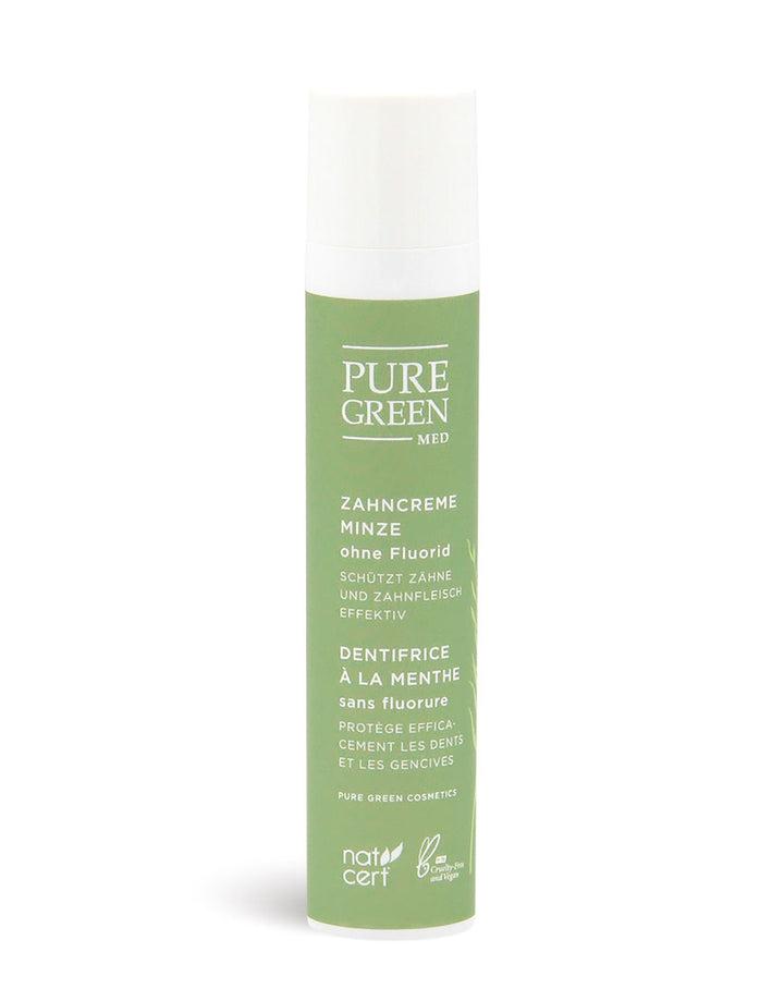 Zahncreme Minze mit Minzöl & natürlichen Putzkörpern, ohne Fluorid, zertifiziert vegan und cruelty-free, in zylindrischer Tube mit Natrue-Siegel, für frischen Atem und saubere Zähne.