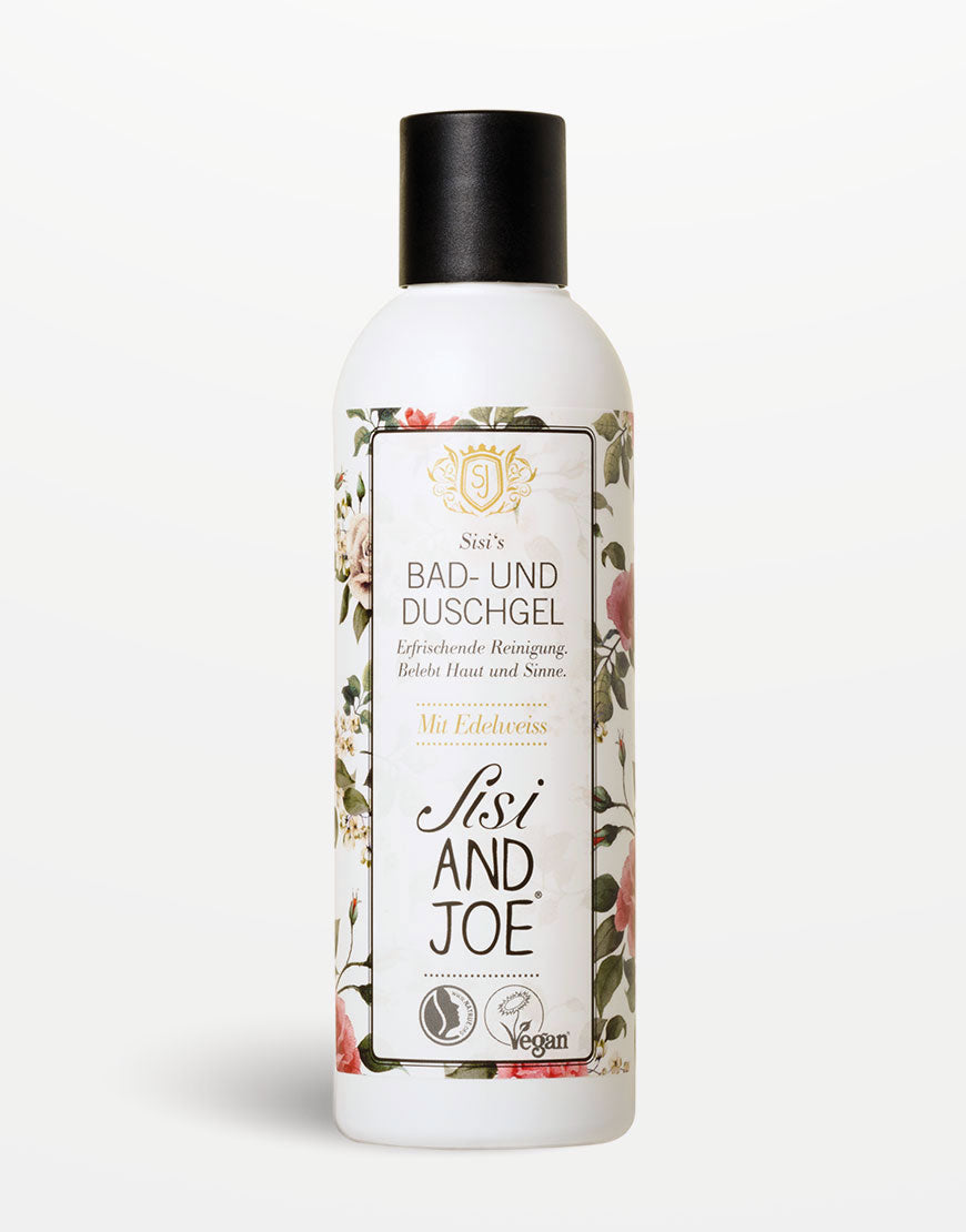 Edelweiss-Duschgel mit Apfelsaft & Aprikosenkernöl, vegan, in zylindrischer Flasche mit Blumenrand, schwarzem Deckel, veganem und tierversuchsfreien Siegeln.