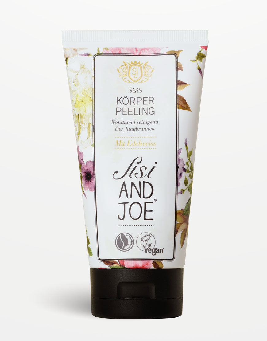 Sisi & Joe Körperpeeling-Tube mit floralem Design, Edelweißextrakt, veganem und dermatologisch getestetem Logo. Enthält Aprikosenkern-Peelingkörner für sanfte, glatte Hautpflege.
