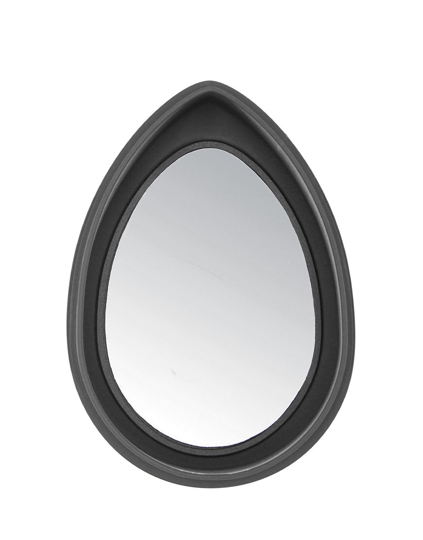 Reise-Haarbürste mit flexiblem Kunststoffstiften und integriertem Spiegel, ideal für sanftes Entwirren und praktisches Styling unterwegs, in einem schwarzen Rahmen eingefasst.