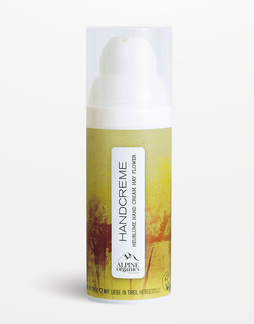 Handcreme Heublume für zarte & gepflegte Hände | Bio & Vegan: Zylindrische Pumpflasche Alpine Organics, Tirol, mit BIO-Wiesenkräuterextrakten und BIO-Rizinusöl für trockene Hände.