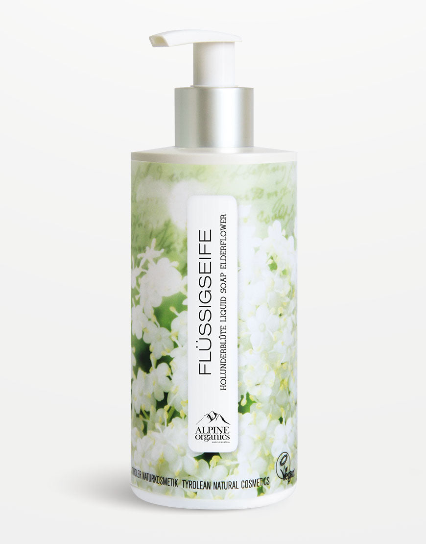 Flüssigseife mit Holunder für sanftes Händewaschen, zeigt eine Pumpeflasche von Alpine Organics, verziert mit Holunderblüten, vegan und Tiroler Naturkosmetik.