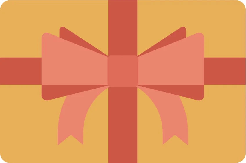 Geschenkgutschein | Pure Green Cosmetics: Eingepacktes Geschenk mit rotem Band und Schleife, ideal als nachhaltiges Kosmetik-Geschenk.