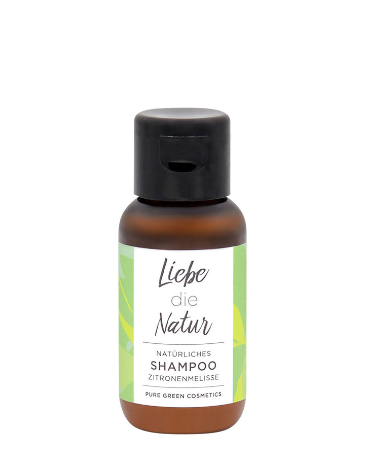 Kleine Flasche mit der Aufschrift „Liebe die Natur“ und „Natürliches Shampoo Zitronenmelisse“, Bio & Vegan, für frisches Haar und natürlichen Glanz.