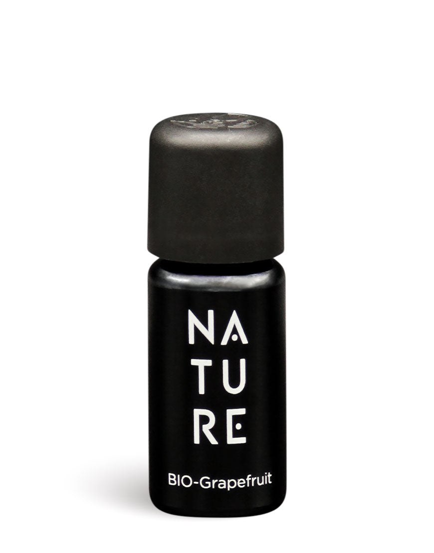 Mattschwarzes Vial mit schwarzem Schraubverschluss, beschriftet mit NATURE BIO-Grapefruit, ideal für stimmungsaufhellende und energetisierende Aromatherapie mit reinem, bio-veganem Grapefruitöl.