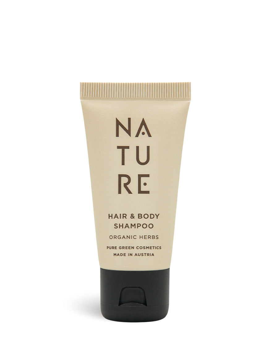 2-in-1 Shampoo & Duschgel mit Kräuterextrakt für gesundes & gepflegtes Haar. Beige Tube mit schwarzem Klappverschluss, Pure Green Cosmetics, Made in Austria etikettiert.