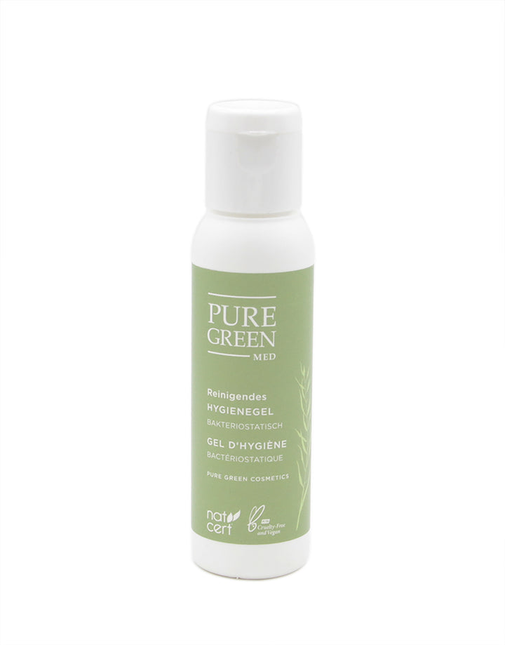 Kleine Plastikflasche mit Flip-Top-Verschluss des PURE GREEN MED Hygienegels, das antibakteriell wirkt und vegan sowie cruelty-free zertifiziert ist.