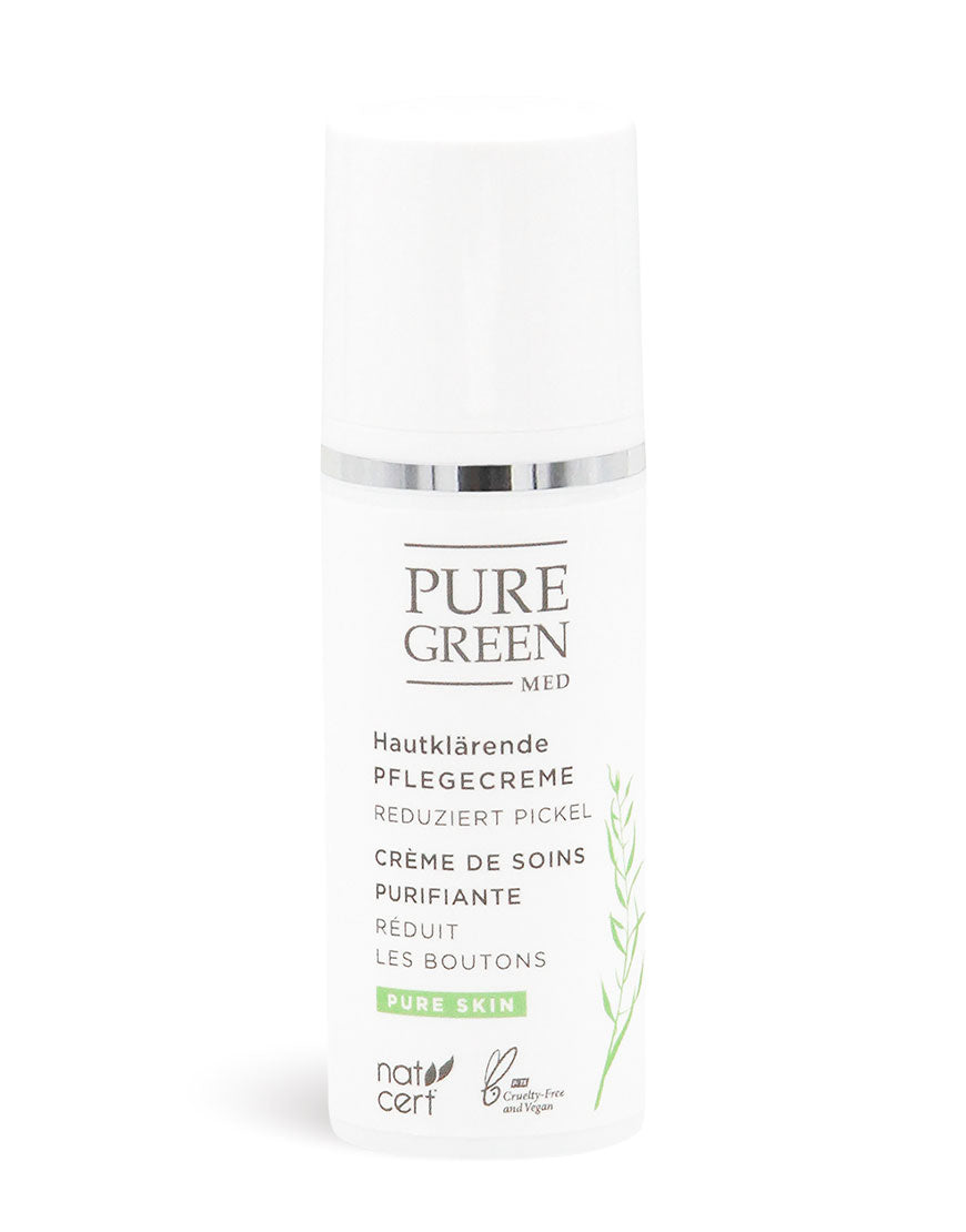 Hautklärende Pflegecreme von Pure Green Med im weißen Pumpbehälter, reduziert Pickel mit Teebaumöl, Bio- und Vegan-Siegel, für unreine Haut.