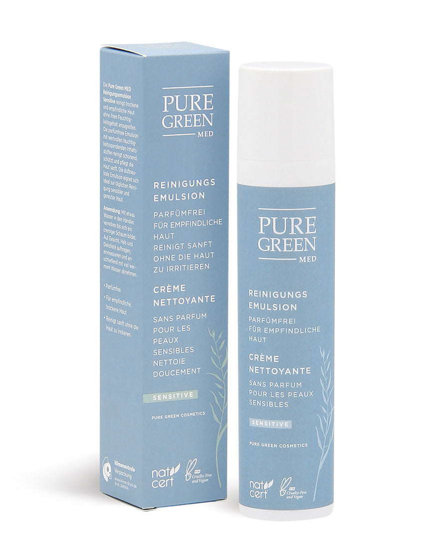 Reinigungsemulsion mit feuchtigkeitsspendenden Inhaltsstoffen und Vitamin E, Bio und Vegan, in blauer Karton- und Pump-Flasche-Verpackung. Parfümfrei für empfindliche Haut, cruelty-free.