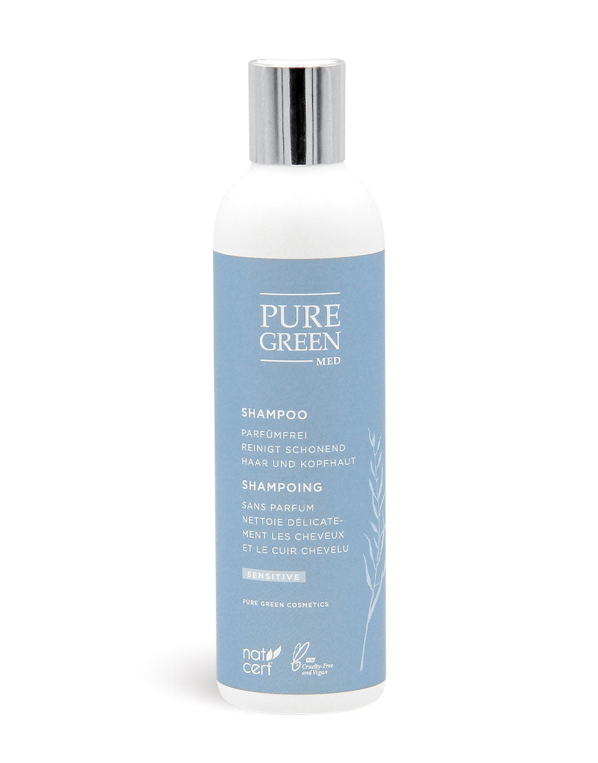 Shampoo Sensitive mit Aloe-Vera & Calendulaextrakt für sanfte Reinigung, in einem weißen zylindrischen Behälter mit metallischem Verschluss, Bio & Vegan, parfumfrei.