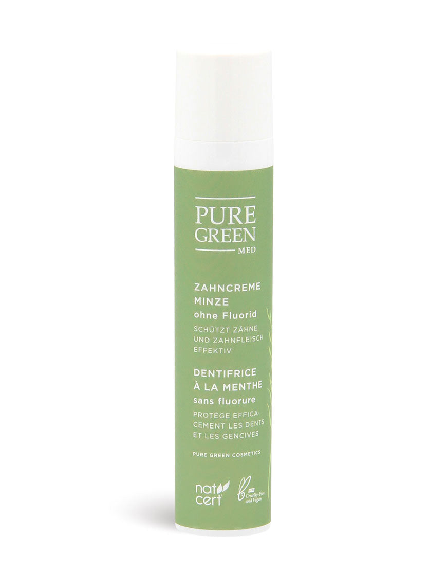 Zahncreme Minze mit Minzöl & natürlichen Putzkörpern, ohne Fluorid, zertifiziert vegan und cruelty-free, in zylindrischer Tube mit Natrue-Siegel, für frischen Atem und saubere Zähne.
