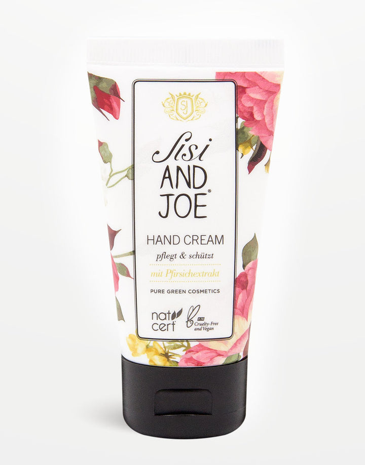 Peachy Kiss Handcreme mit Pfirsichextrakt, BIO-Aloe Vera, vegan, cruelty-free im floral gestalteten Sisi AND Joe Tube; feuchtigkeitsspendend, schützend, hergestellt in Österreich.