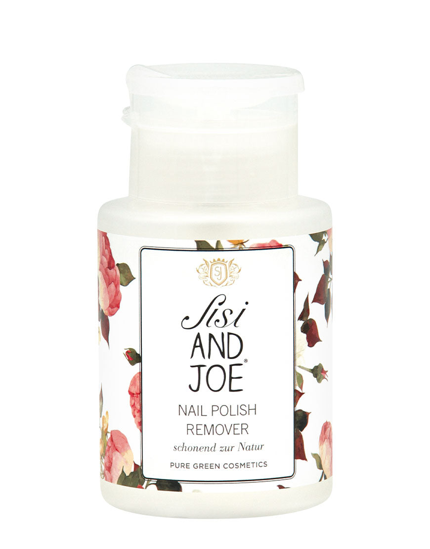 Nagellackentferner mit Orangenöl & Zitronenöl von Sisi AND JOE, in einer weißen Flasche mit Blumenmotiv, schonend und vegan, ohne Aceton.