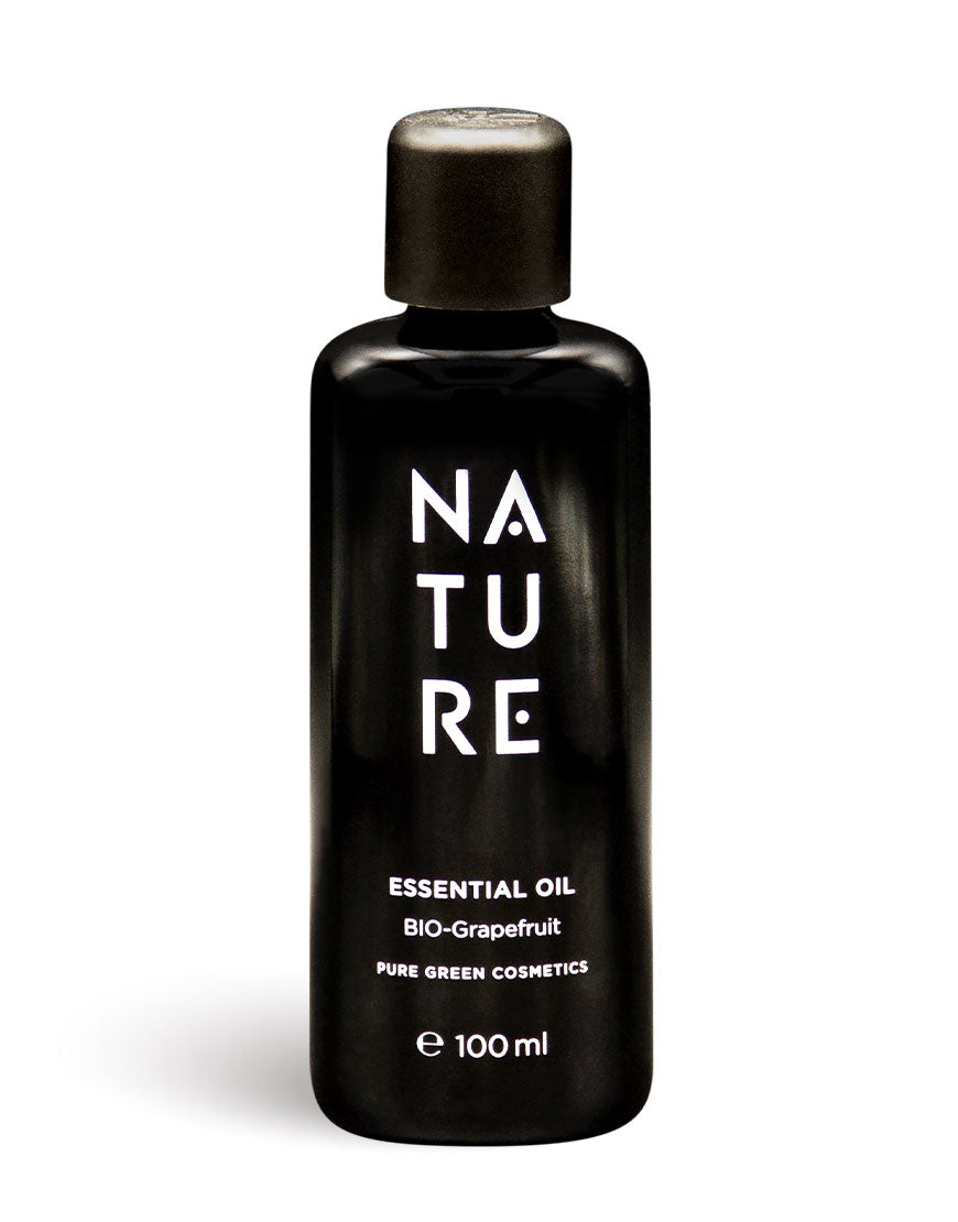 Schwarze 100 ml Flasche Grapefruit-Öl, reines ätherisches Öl mit spritzigen Zitrusnoten, ideal für stimmungsaufhellende Aromatherapie. Bio, vegan, aus Österreich.